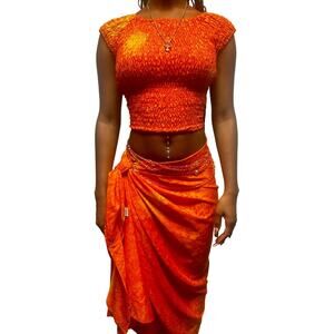Gorgeous vibrant orange vacation co-ord set with crop top and sarong skirt